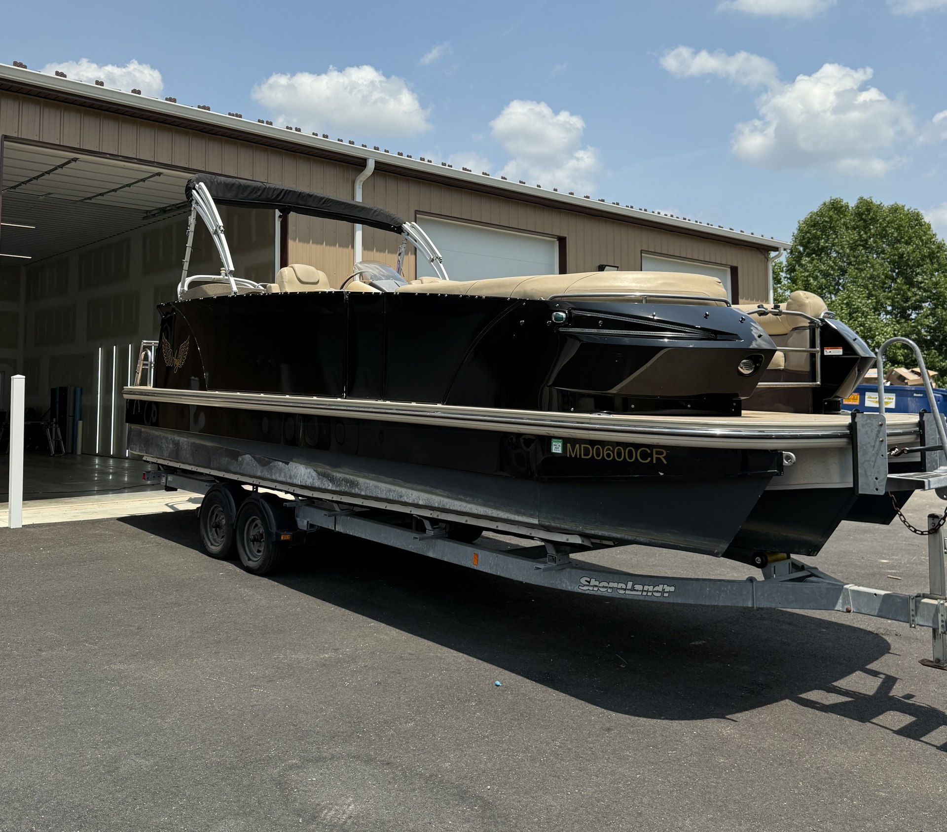 Angel — boat hull wrap by Coastal Wraps